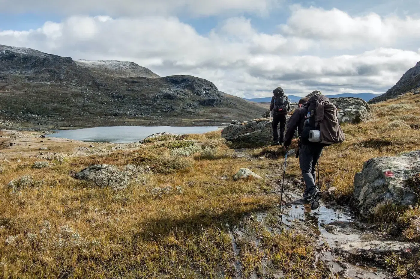 Men trecking in the Mountains